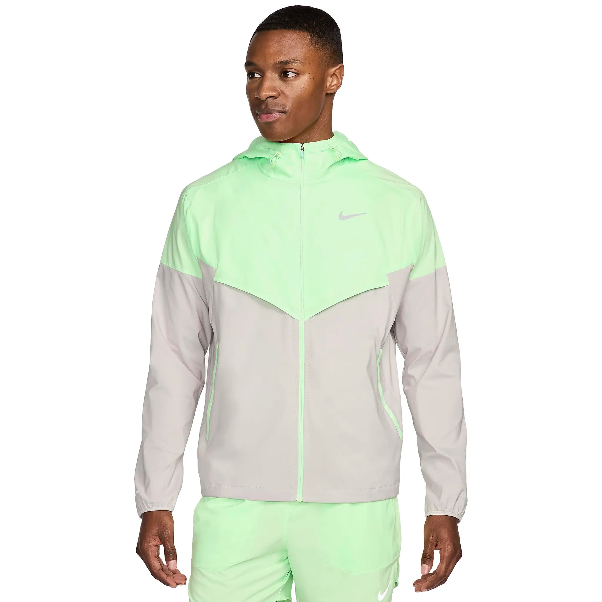 Model Front view of Nike Repel Packable Vapour Green Light Iron Ore Windrunner Jacket FB7541-376